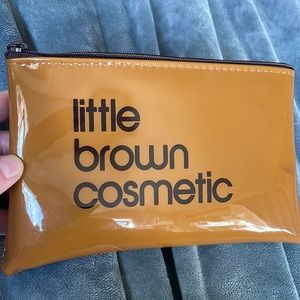 Little brown cosmetic bag